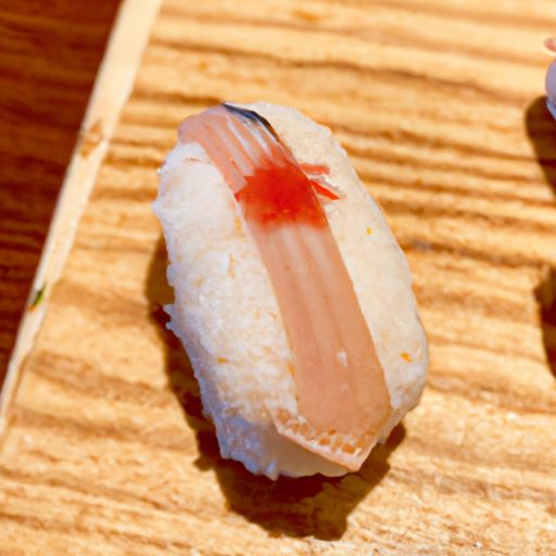 日本游泳鱼骨寿司日本游泳鱼骨寿司：一种传统美食的独特味道 日本游泳鱼骨寿司店图1